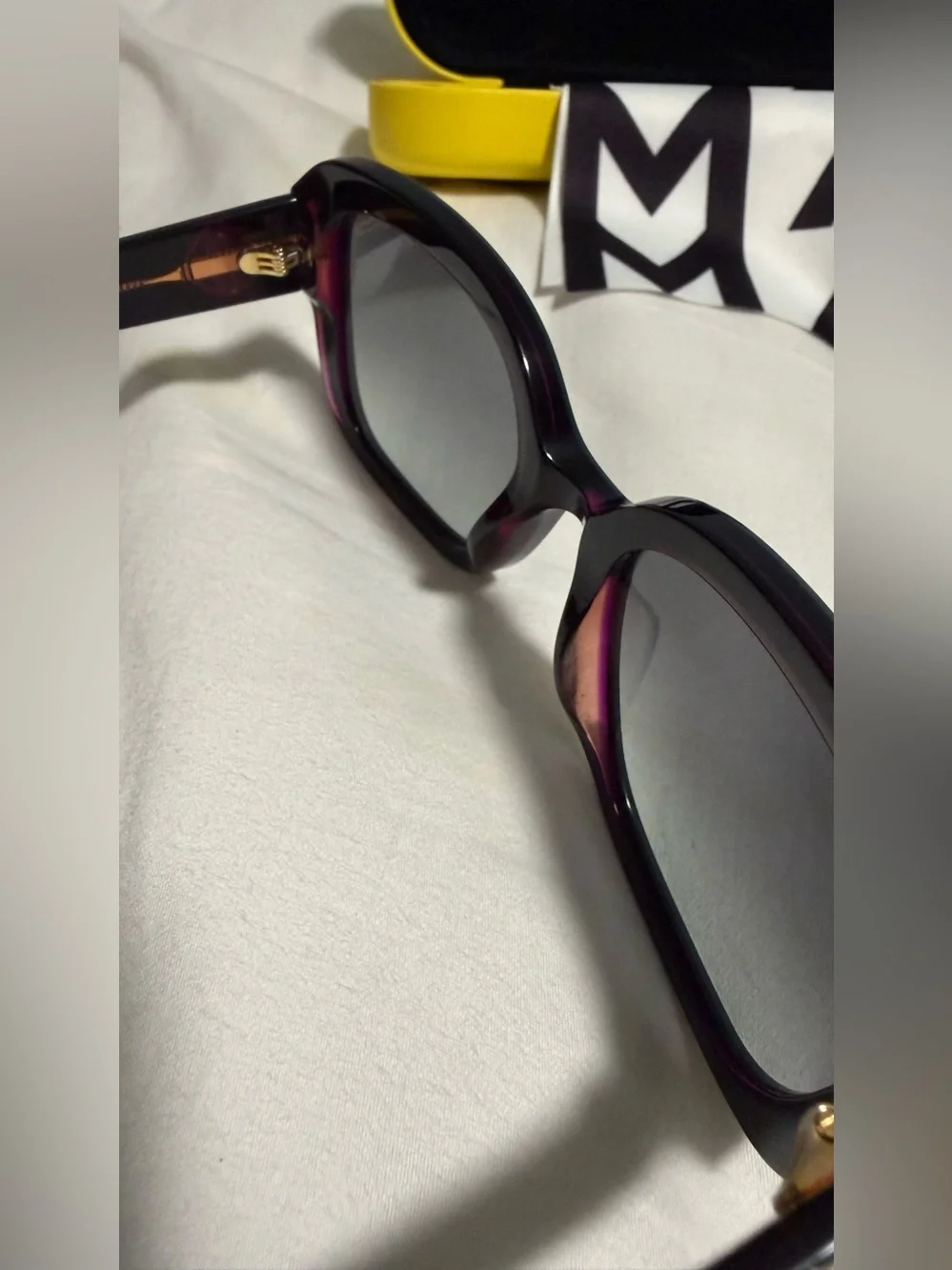 Marc Jacobs Woman’s Dark Teal Square Sunglasses with alternating pink hues! New